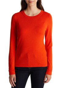 Long-sleeve crew neck sweater in bright orange, made of soft fabric with ribbed cuffs and hem, featuring a smooth texture and fitted shape.
