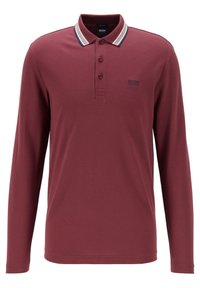 Marin långärmad polo med krage, tre knappar och kontrasterande randiga detaljer på kragen. Har en logotyp på bröstet.