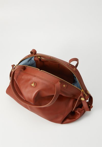 Brown leather bag with a textured finish, featuring gold hardware, dual zippers, and a blue interior lining. Includes dual handles for carrying.