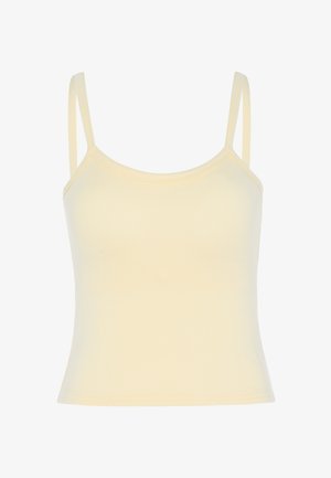 Cremefarbenes, geripptes Tanktop mit dünnen Schulterträgern und geradem Ausschnitt, auf weißem Hintergrund dargestellt.
