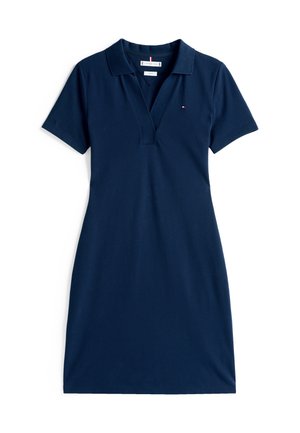Navy polo dress in cotton fabric, featuring a classic fold-over collar, short sleeves, and a subtle logo detail on the chest.
