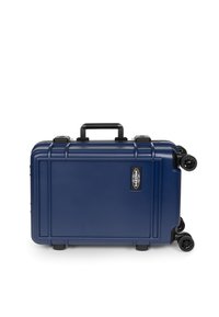 Merkkilogo näkyvästi esillä, tummansininen kovakuorinen matkalaukku, jossa on teksturoitu pinta, vedettävä kahva ja neljä mustaa pyörää.