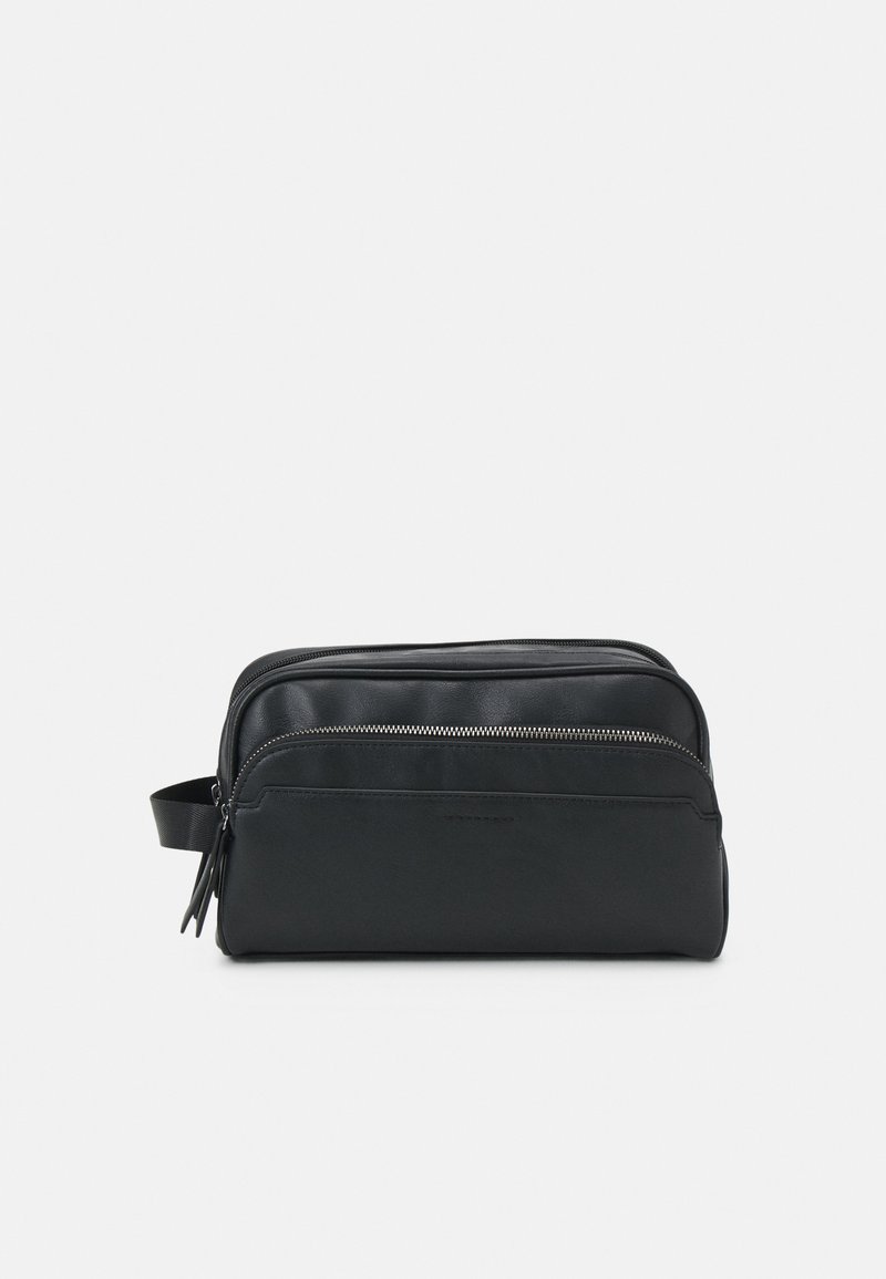 Black zippered travel bag with a smooth leather texture, rectangular shape, and side handle. Features a front zip compartment.