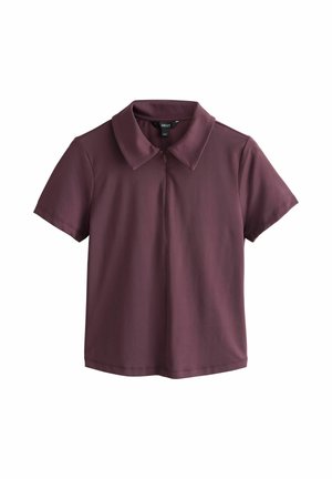 Camicia bordeaux a maniche corte con colletto e cerniera frontale, mostrata distesa su uno sfondo bianco.