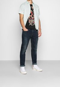 Levi's® Jeans Tapered Fit - dark-blue denim