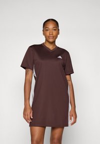Brown athletic dress with short sleeves and a V-neck, featuring white side panel accents and the Adidas logo on the chest. Smooth texture.
