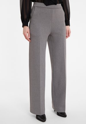 Graue weite Hose mit vertikalen Streifen, aus strukturiertem Stoff. Verfügt über eine taillierte Taille und eine elegante Silhouette.