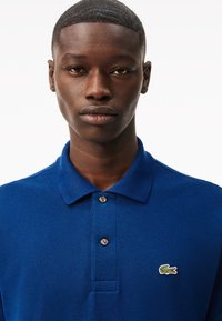 Lacoste Pikeepaita - bleu hbm