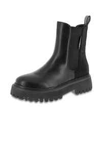 Botín Chelsea de cuero negro con suela gruesa y con textura, paneles laterales elásticos, tirador en el talón y detalle texturizado en la parte posterior.