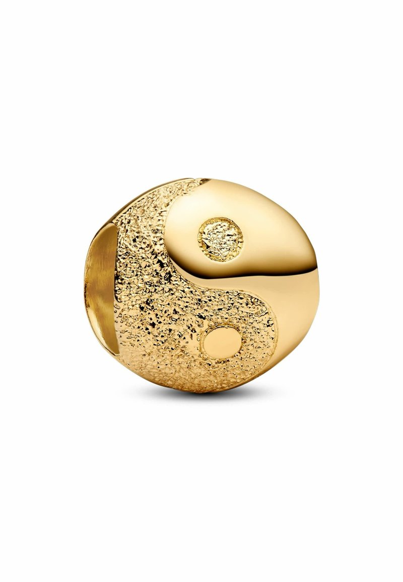 Goldfarbener Yin-Yang-Anhänger mit einer glatten und einer strukturierten, gepunkteten Hälfte, die zwei kontrastierende runde Akzente aufweist. Abgerundete Form.