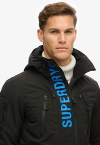 Superdry & Co ULTIMATE SD CHEATER - Chaqueta de entretiempo - black blue bay