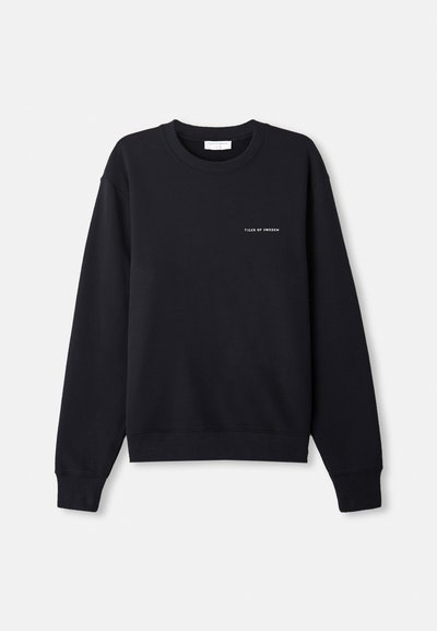 Black sweatshirt with a crew neck, ribbed cuffs, and hem. Features white text that reads "TIGER OF SWEDEN" on the chest. Soft texture.
