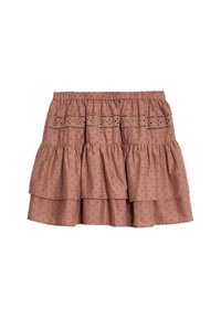 Tierskjorta i brunt gjord av lättviktsmaterial, med broderi i ögonhål och elastiskt midjeband för en avslappnad passform.