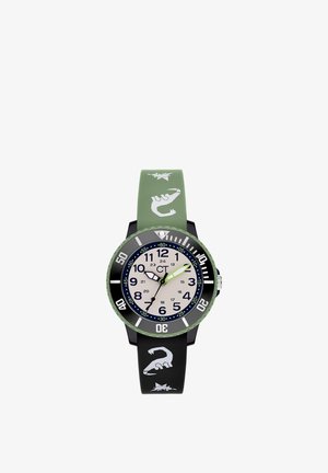 Green and black watch with a round face, white markings, and a patterned silicone strap featuring prints of claws and stars.
