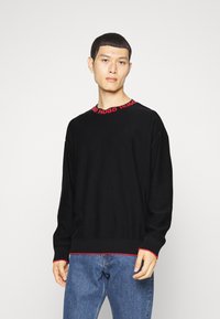 HUGO SMARLO - Strikkegenser - black