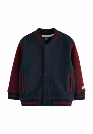 Marineblau und burgunderfarbene Bomberjacke mit geripptem Kragen und Bündchen, Druckknöpfen und Seitentaschen. Weicher Stoff mit Farbblockdesign.