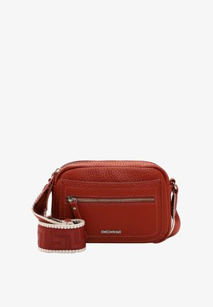 Red leather crossbody bag with structured shape, textured surface, front zip pocket, and adjustable woven strap featuring metallic accents.