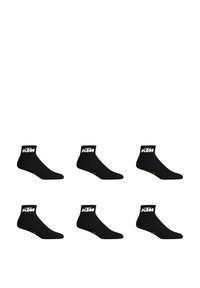 Chaussettes noires avec un bord côtelé, arborant un logo blanc. Chaque chaussette a une forme similaire avec un renfort au niveau des orteils et du talon pour plus de durabilité.