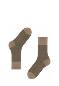Braune Socken mit einem Fischgrätenmuster, verziert mit einfarbigen Akzenten an der Spitze und am Bündchen. Hergestellt aus einem glatten, strukturierten Material.