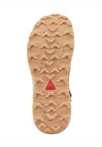 Rubber shoe sole with a textured beige surface. Features triangular and zigzag patterns for traction. Red triangular accent at the center.