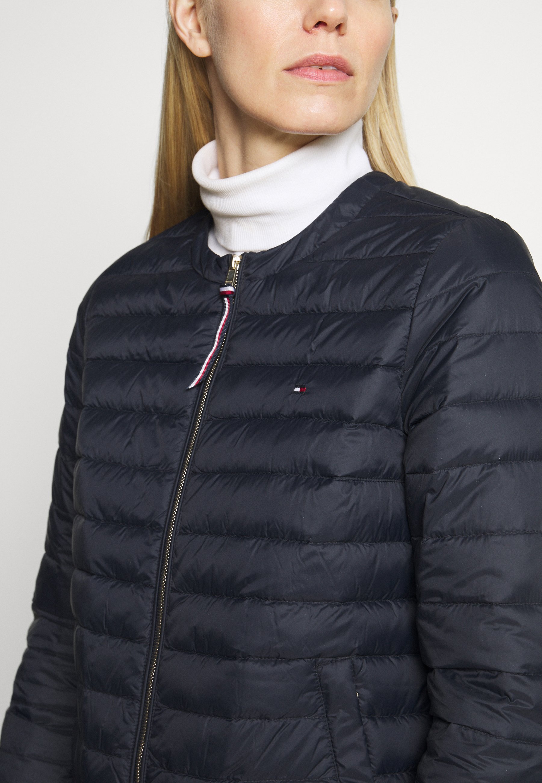 collarless down coat