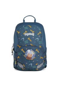 Blue ergonomic backpack with a space-themed pattern. Features yellow rockets, green accents, and a circular plush badge on the front pocket.
