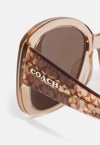 COACH Ochelari de soare - transparent brown