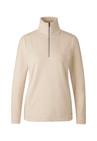 Beżowy sweter typu pullover z wysokim kołnierzem i zamkiem na ćwierć długości, długie rękawy, gładka faktura i minimalistyczny design. Zawiera subtelne detale przeszyć.