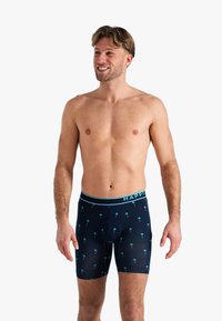 Marine boxer briefs met een palmbomenpatroon, elastische tailleband met de tekst "HAPPY", zachte stof en een getailleerd ontwerp.