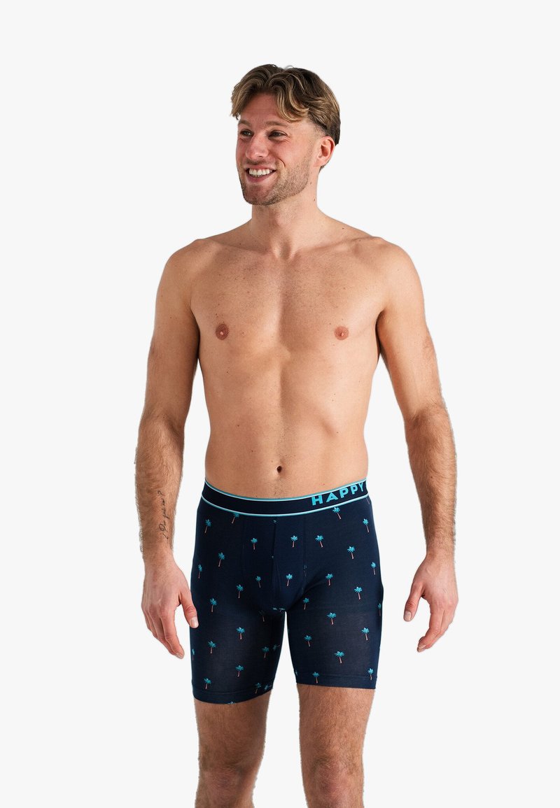 Marine boxer briefs met een palmbomenpatroon, elastische tailleband met de tekst "HAPPY", zachte stof en een getailleerd ontwerp.