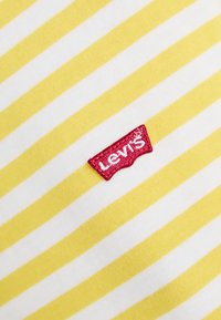 Levi's® T-shirt imprimé - sandy/script yellow