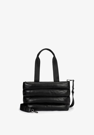 Black rectangular padded handbag with dual top handles and detachable shoulder strap on a white background.
