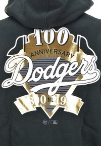 Felpa nera con cappuccio caratterizzata da una grafica in oro e bianco che recita "100 ANNIVERSARY Dodgers" con un design di baseball vintage e la data "1860 NL 1990".