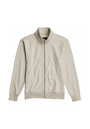 Hellgraue Zip-Jacke aus weichem Stoff. Sie verfügt über einen hohen Kragen, zwei Fronttaschen sowie gerippte Bündchen und Saum.