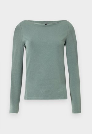 Long-sleeve shirt in soft, light green fabric. Features a wide neckline and fitted design with smooth texture and clean seams.