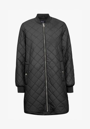 Kvidruotas juodas išorinis džemperis su užtrauktuku, su apykakle ir šoninėmis kišenėmis. Pasižymi lygiu paviršiumi ir pritaikytu siluetu.