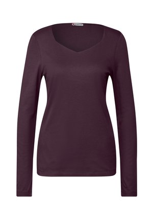 Haut à manches longues, de couleur bourgogne profond avec un décolleté en V. Texture lisse, forme ajustée et détails simples à l'ourlet.