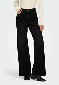 ONLY Džinsi ar paplatinātiem galiem - washed black
