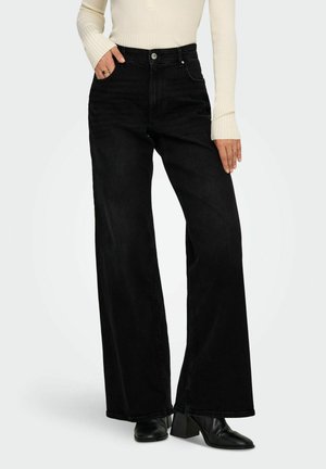 Flared Jeans - washed black