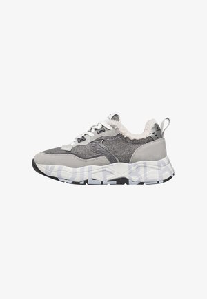 Gray and white sneakers with a mix of textures, featuring faux fur collar, padded tongue, and bold lettering on the sole.