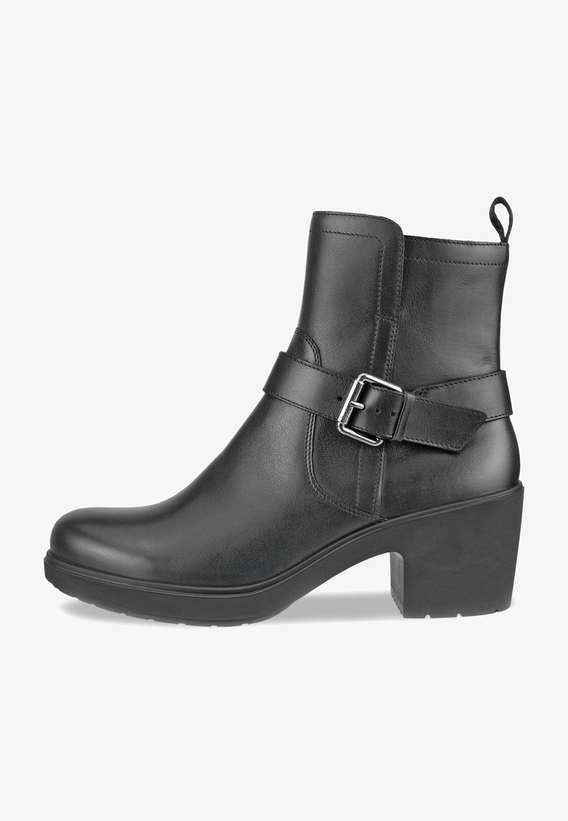 Bottine en cuir noir avec talon carré, bride latérale à boucle et languette à l'arrière.