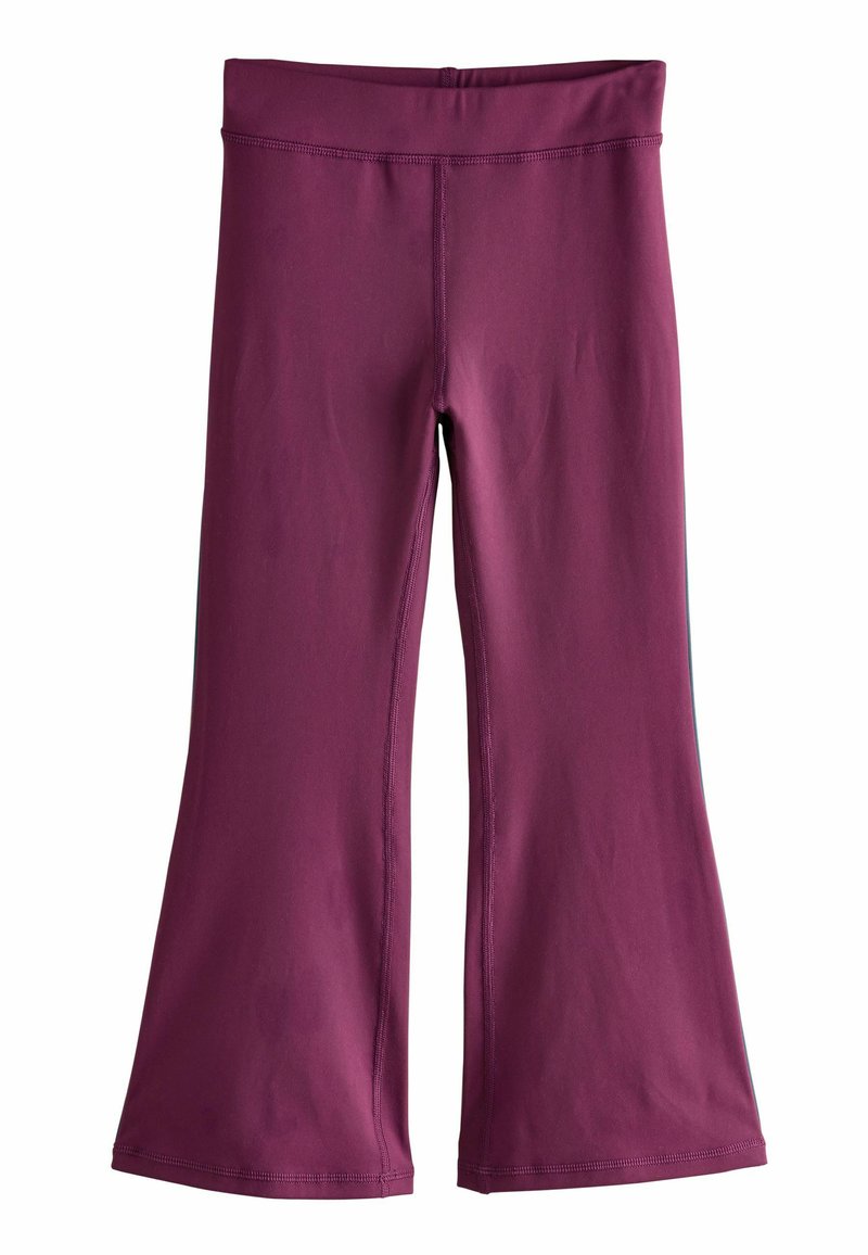 Leggings évasés en violet profond, fabriqués en tissu lisse et extensible. Dotés d'une large ceinture et de coutures soignées le long des joints.