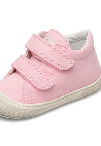 Pink canvas shoe with two velcro straps, round toe, and textured white rubber sole. Soft interior lining and stitched detailing.
