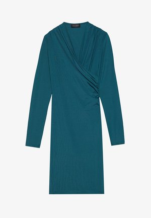 Tummansininen mekko pitkilla hihalla, jossa on laskostettu pääntie ja kerätty yksityiskohta vyötäröllä, valmistettu sileästä ja teksturoidusta kankaasta.