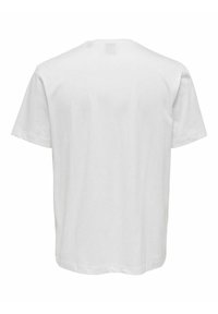 White cotton t-shirt with short sleeves, crew neckline, and a plain back. Features a straight hem with no visible patterns or accents.