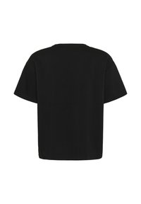 T-shirt nera a maniche corte in cotone, con collo rotondo classico e vestibilità comoda, dalla texture liscia e senza loghi visibili.