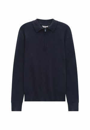 Merino villapaita tummansinisellä värillä, kauluksella, neljänneksen pituisella vetoketjulla, pitkät hihat ja resorikuvioiset hihansuut ja helma, valmistettu pehmeästä puuvillasekoitemateriaalista.