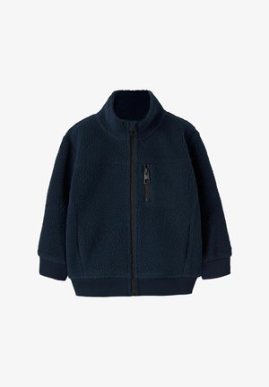 Navy fleece jacket with high collar, zip closure, and pockets. Features textured fabric and elastic cuffs at sleeves and hem for a snug fit.
