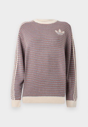 Πλεκτό πουλόβερ με πολύχρωμο σχέδιο σε κόκκινο, μπλε και κρεμ. Διαθέτει ριμπ μανσέτες και στρίφωμα, με λεπτομέρεια λογότυπου σε κρεμ αποχρώσεις στο στήθος.