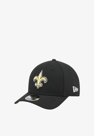 Black baseball cap features a prominent gold and white fleur-de-lis emblem. Constructed from cotton with a curved visor.